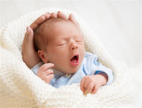 Newborn Baby Sleeping in Mother Hands, New Born Boy with Open Mouth ...