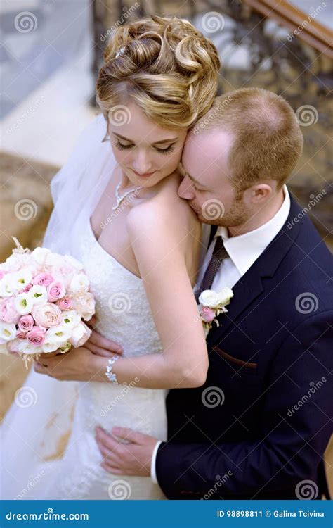 Wedding Couple Indoors Is Hugging Each Other Stock Image Image Of