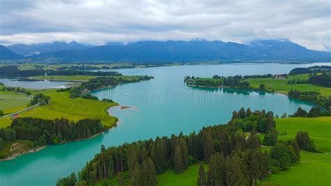 Aerial View Over Lake Forggensee At The City Of Fuessen In Germany