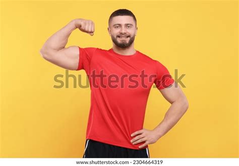 29383 Strong Man Showing Muscles Images Stock Photos And Vectors