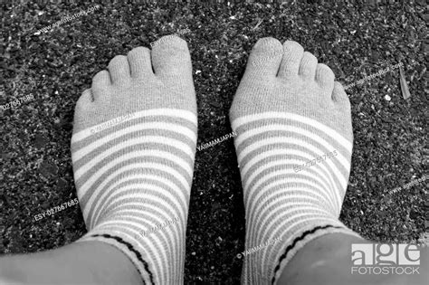 wear socks five fingers style on Black and White, Stock Photo, Picture And Low Budget Royalty ...