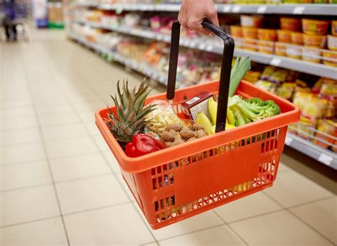 Woman With Food Basket At Grocery Or Supermarket Stock Image Image Of