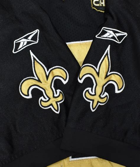 Reebok（リーボック）の「【ヴィンテージ古着】reebok リーボック Nfl New Orleans Saints ゲームシャツ（t