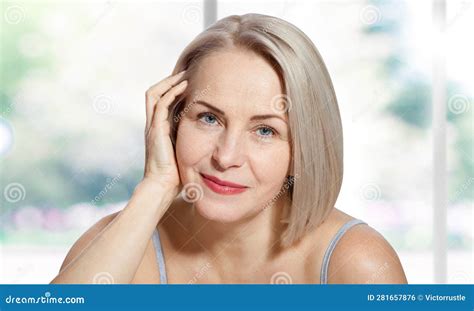 Happy Beautiful Middle Aged Blonde Woman Shows Off Her Perfectly Well