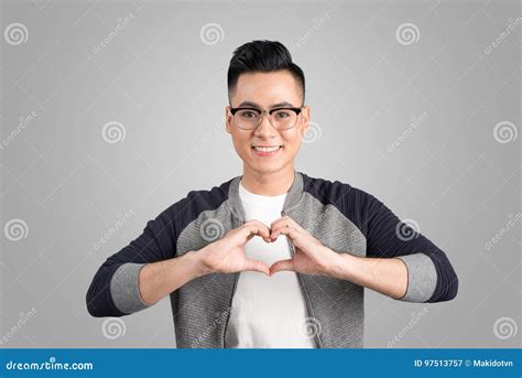 Closeup Portrait Handsome Smiling Young Business Man Makes The Heart