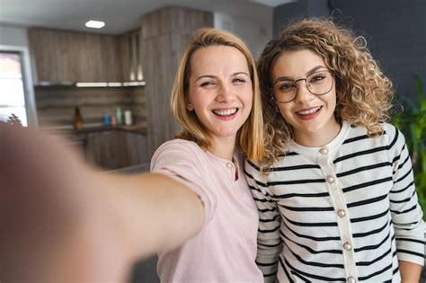 Premium Photo Two Women Taking A Selfie