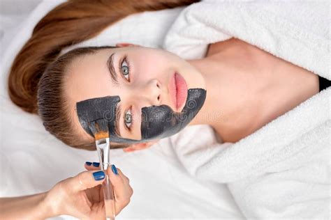 Professional Cropped Plastic Surgeon Drawing Contours On Woman S Face