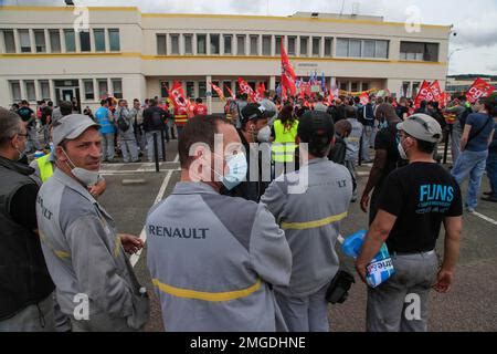 Renault Workers Wear Protective Face Masks As They Stage A Protest