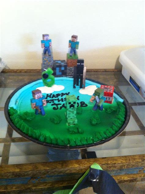 Minecraft cookie cake. I just had the store do the grass and sky scene ...