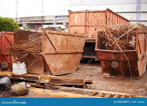 Recycle Metal And Rust On Skip In Junkyard For Sorting Garbage And