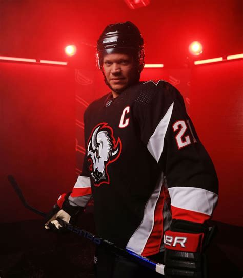 sabres unveil revamped black  red goathead  jersey buffalo