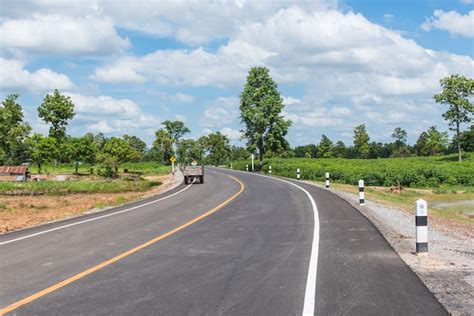 Premium Photo A Winding Country Road In Thailand