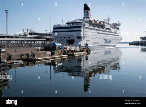 Cruise Ship Of Tallink Ferry Company Mirrored In The Water In Port Of