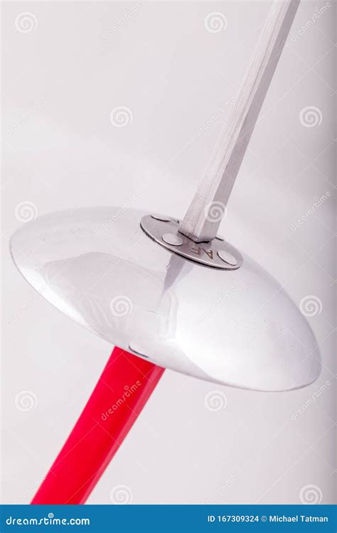 Closeup of a Foil Sword with a Red Handle Stock Photo - Image of ...