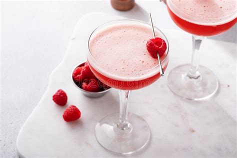 Raspberry Martini Cocktail With Vodka Juice And Raspberry Liqueur