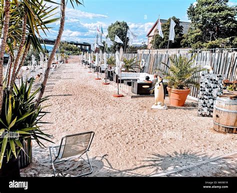 City beach (Rheinstrand) in Mainz-Kastel with theodor-heuss bridge in ...