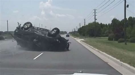 Dashcam video shows wild police chase end with car rolling and ejecting driver - ABC News