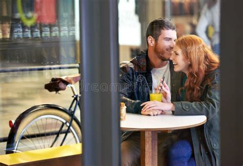 They Couldnt Be Happier A Happy Young Couple On A Date At A Cafe