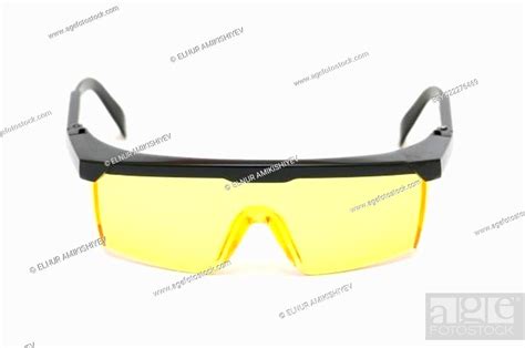 Yellow Safety Glasses Isolated On The White Background Stock Photo