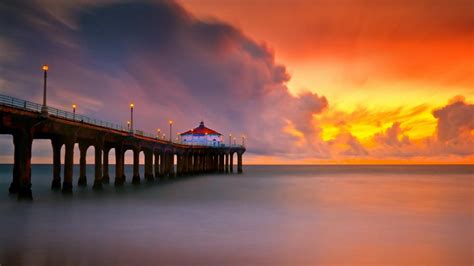 Orange sunset and the Manhattan Beach Pier view wallpaper - backiee