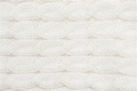 Premium Photo White Wool Knitted Braid Texture Close Up