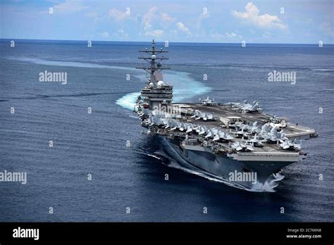 The Us Navy Nimitz Class Aircraft Carrier Uss Ronald Reagan Sails