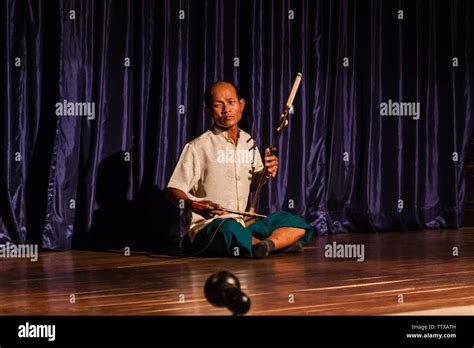 A Musician Playing Tro A Traditional Khmer Music Instrument Stock