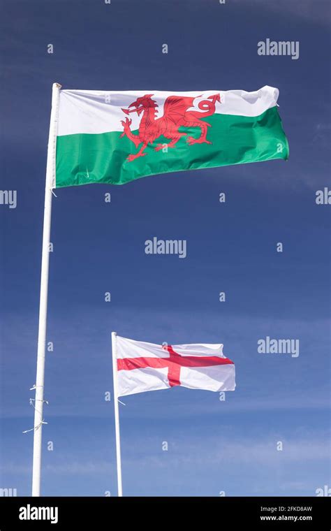 Wales and England national flags Stock Photo - Alamy