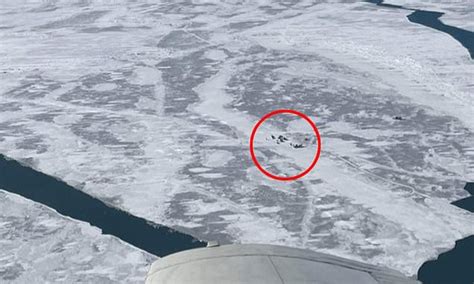 Coast Guard Launches Mass Rescue Of 18 Snowmobilers From Ice Slab That