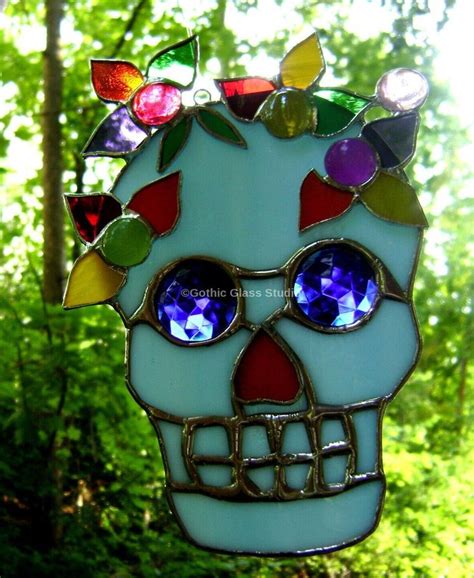 A Stained Glass Skull Hanging In The Woods