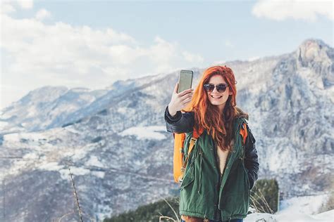 Woman Takes A Selfie Outdoors By Stocksy Contributor Lumina Stocksy