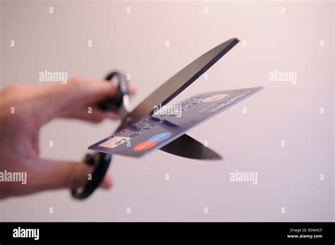 Cutting Up Credit Card Stock Photo Alamy