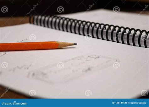 Notebook and Pencil with Project Sketches Stock Photo - Image of object, writing: 136141540