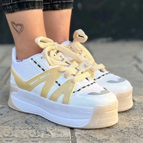 خرید و قیمت کتانی دخترانه NAKED WOLFE کرم جنس رویه چرم صنعتی PU مش جنس