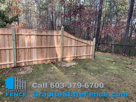 Cedar Scalloped Wood Fence And Chain Link Fencing Installed In