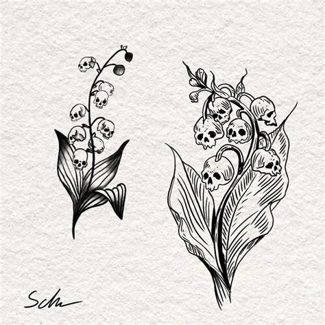 Two Flowers With Skulls On Them Are Drawn In Black And White Ink While