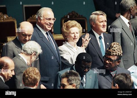 West German Chancellor Helmut Kohl Left British Prime Minister