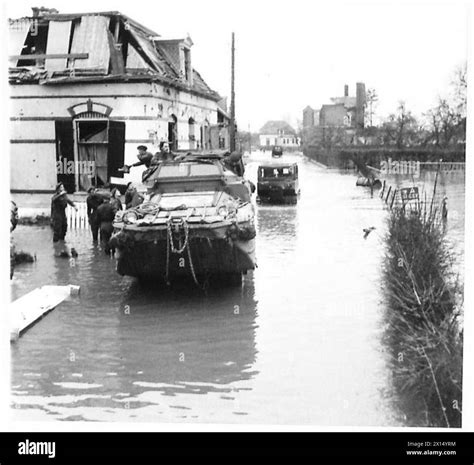 SPECIAL FOR KEMSLEY NEWSPAPERS LTD SHEFFIELD - Scenes in the flooded front line village of ...