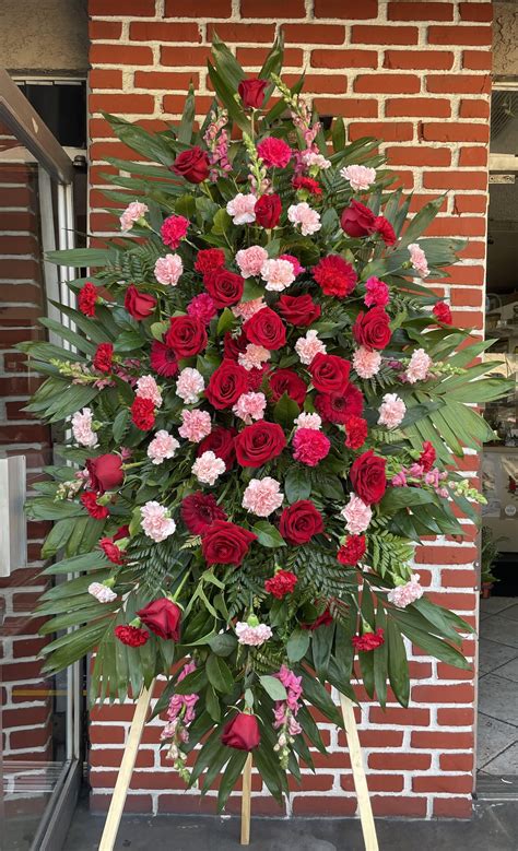 RED AND PINK SYMPATHY FUNERAL STANDING SPRAY in Whittier, CA | Ginza