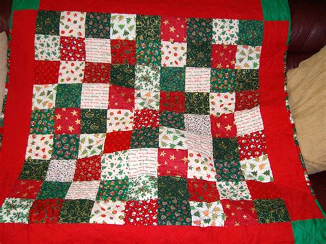 Easy Christmas Quilt Made From Squares Of Different Christmas Materials Made By Julie