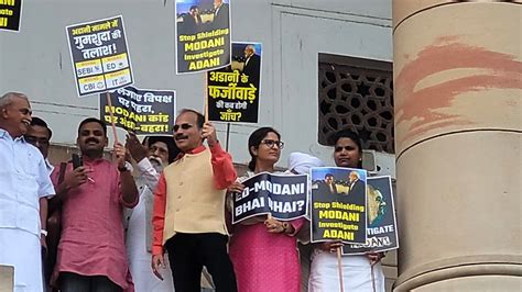 Opposition Parties Protest On First Floor Of Parliament Put Up Banner