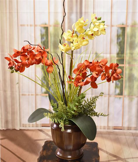 Orange Orchids Arrangements