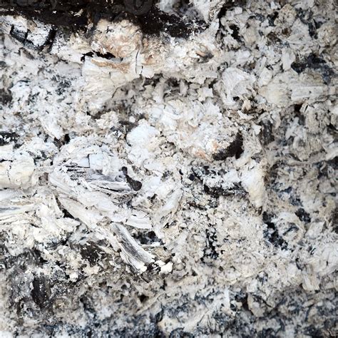Pile of ashes after the fire went out grunge background texture