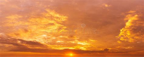 Panorama Nature Background Of Golden Cloudy Sky And Sunrise At Morning