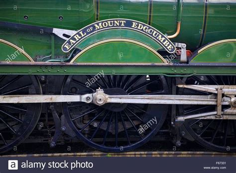 An Old Fashioned Green Train Engine With The Words