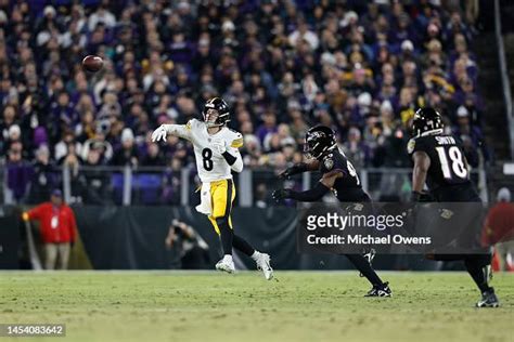 Kenny Pickett Of The Pittsburgh Steelers Passes On The Run During An