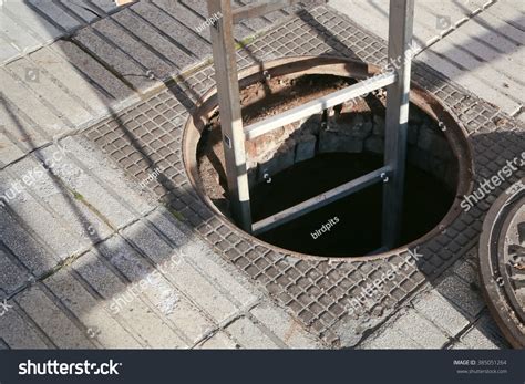 Open Manhole Ladder Stock Photo Edit Now 385051264 Shutterstock