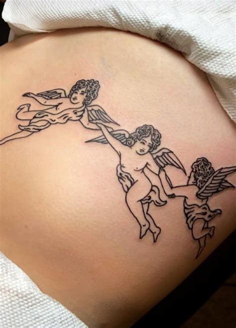 Cherub Tattoos The Designs And Meanings Art And Design