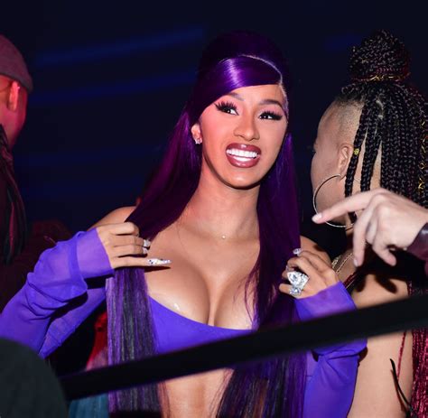 Cardi B Shares Flowing Natural Hair Update And Fact-Checks Trolls