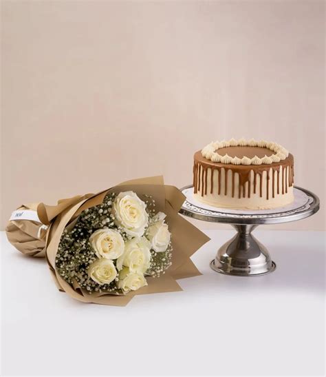 Lotus Cake White Roses Bundle By Sugar Daddy S Bakery In Amman Joi